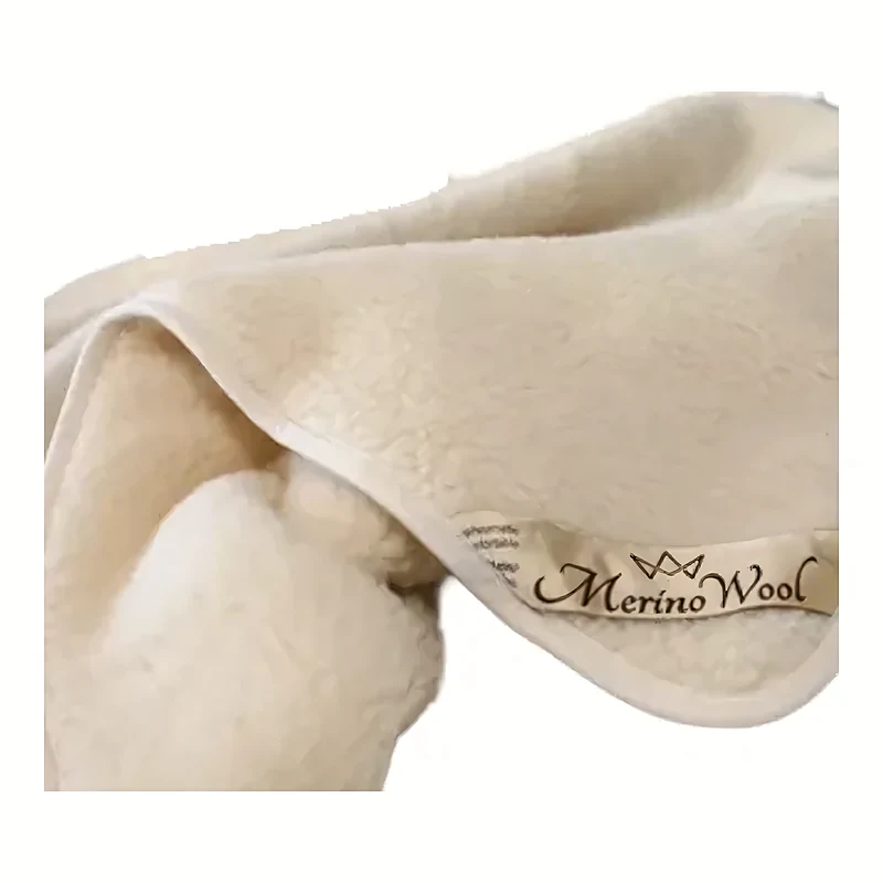 Couette en laine mérinos capitonnée